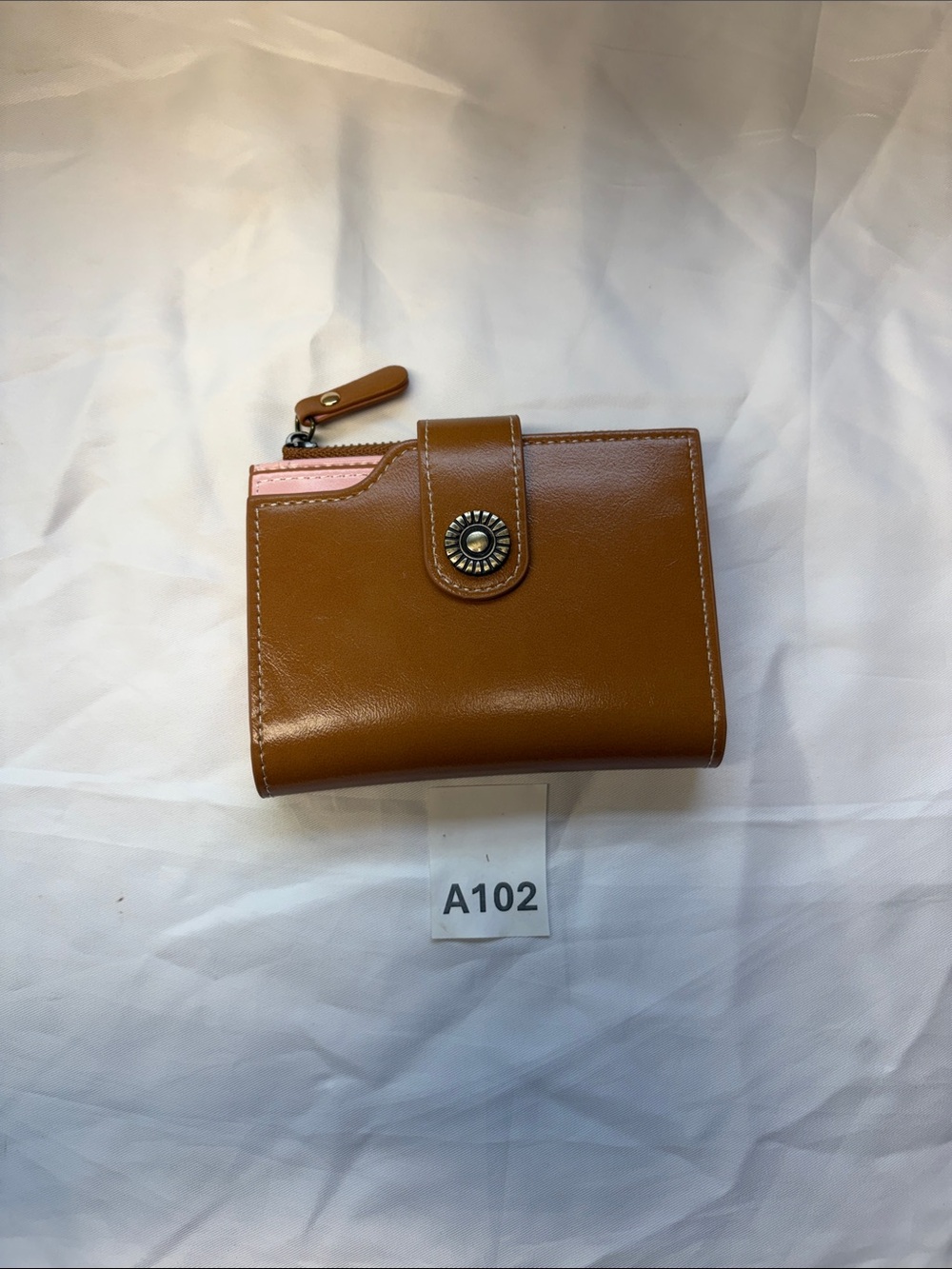Compact Tan Women's Wallet with Snap Closure